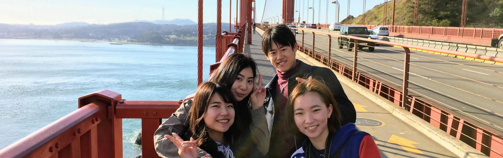 A group of people touring the Golden Gate Bridge.